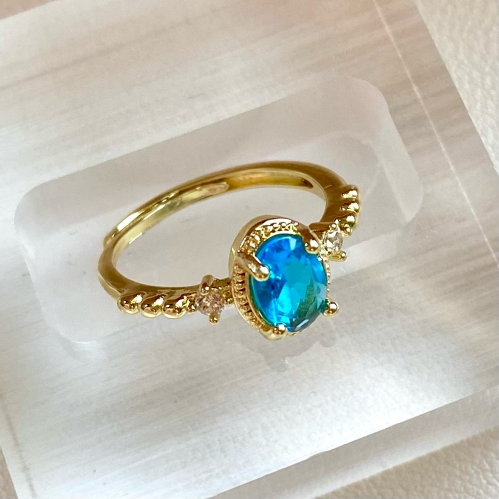 Gold Ring with Blue Gemstone